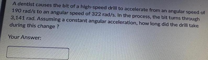 A dentist causes the bit of a high speed drill